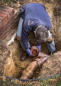 tech performing sewer repair in caldwell idaho